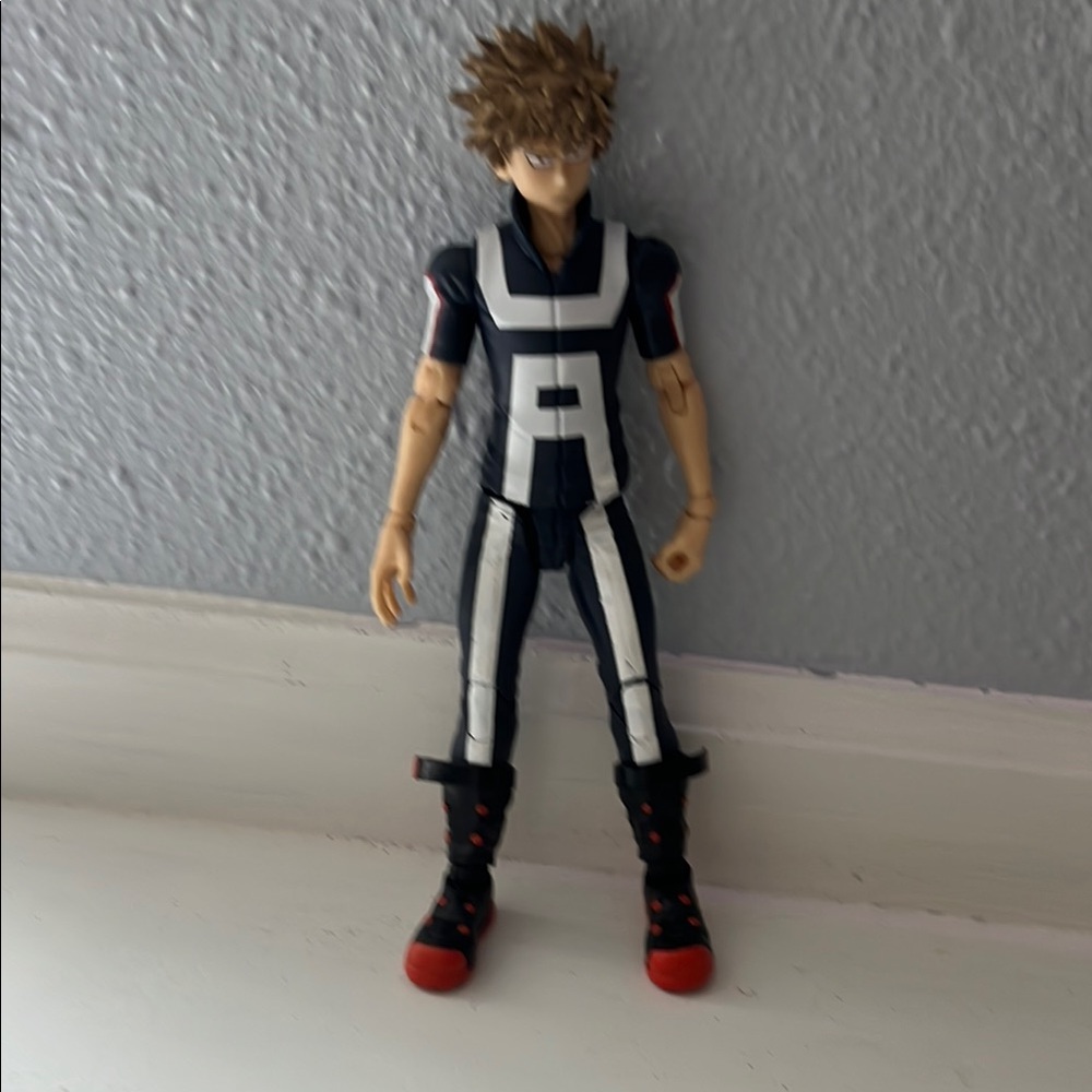 Action Figure with Black and White Suit